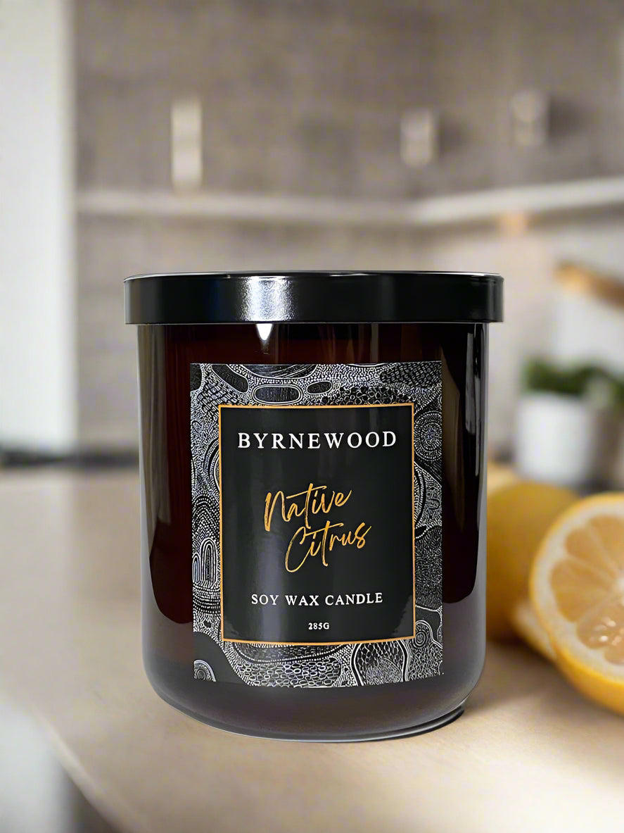 Byrnewood Native Citrus handcrafted scented soy wax candle with a wood wick, poured into a large 285g luxury glass vessel – made on the Gold Coast, Australia for an eco-friendly, clean-burning, and beautifully fragranced experience.