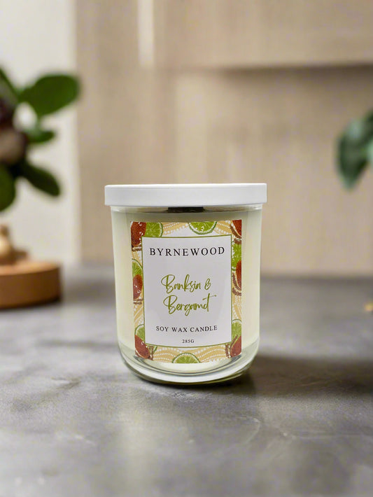 Byrnewood Banksia & Bergamot handcrafted scented soy wax candle with a wood wick, poured into a large 285g luxury glass vessel – made on the Gold Coast, Australia for an eco-friendly, clean-burning, and beautifully fragranced experience.