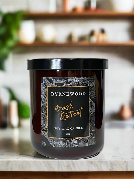 Byrnewood Bush Retreat handcrafted scented soy wax candle with a wood wick, poured into a large 285g luxury glass vessel – made on the Gold Coast, Australia for an eco-friendly, clean-burning, and beautifully fragranced experience.