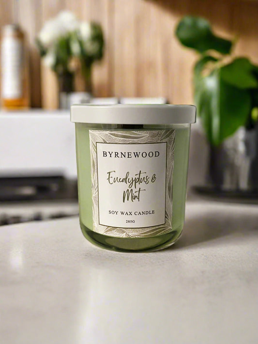 Byrnewood Green Eucalyptus & Mint handcrafted scented soy wax candle with a wood wick, poured into a large 285g luxury glass vessel – made on the Gold Coast, Australia for an eco-friendly, clean-burning, and beautifully fragranced experience.