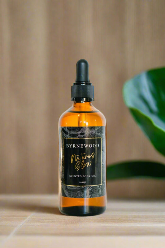 Byrnewood Nature’s Glow Body Oil – nourishing blend of coconut oil, vitamin E, and essential oils for deep hydration and glowing skin; a natural body moisturiser crafted for everyday luxury.